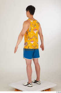  Lan blue shorts dressed sports standing white sneakers whole body yellow printed tank top 0004.jpg